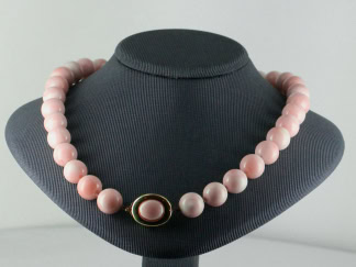 Collier de 36 boules corail peau d'ange