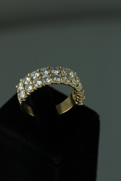 Double alliance en or rose sertie de diamants de synthèse