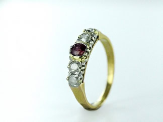 Bague deux ors sertie de rubis et diamants