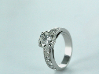 Solitaire diamant, 1/2 taille, or blanc 18K